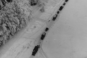 A transport column moves up through the snow