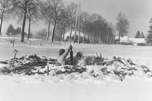 An American dug in mortar emplacement
