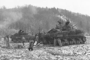 Browse Sherman tanks give supporting fire to 32 Armoured Regiment