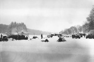 Camouflage netting hides 912th Field Artillery Battaliion