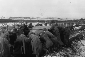 Germans trying to move a vehicle out of the Ardennes mud