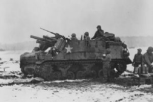 An American tank destroyer crew prepares to fire against enemy positions