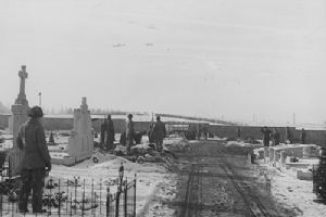 Browse Members of 101st Airborne Division bury their dead