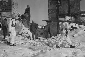 Medics of the infantry pick up their fellow soldiers