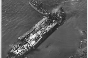 Overhead view of the burning hulk of USS LST-480