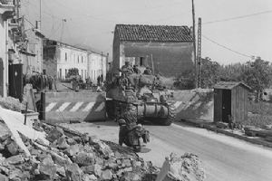 Browse 40th R.T.R passing a road block